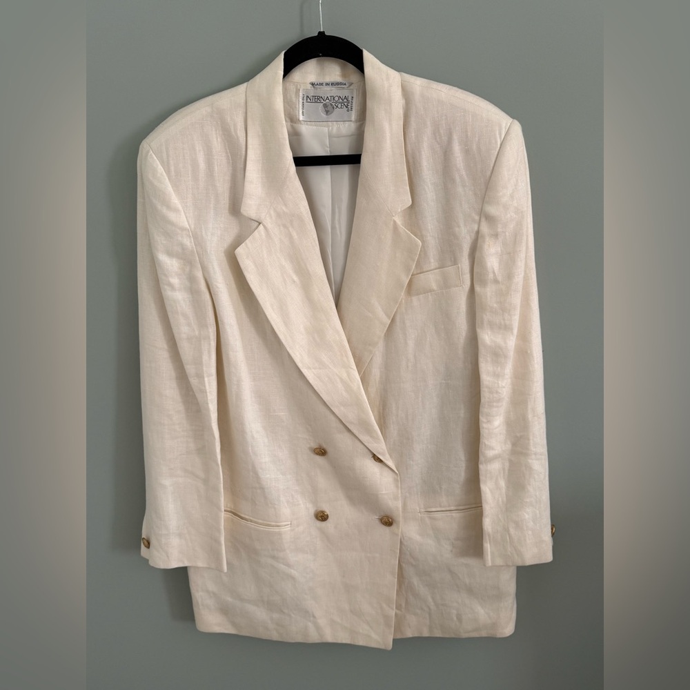 International Scene Cream Double-Breasted Women's Blazer, fully lined.